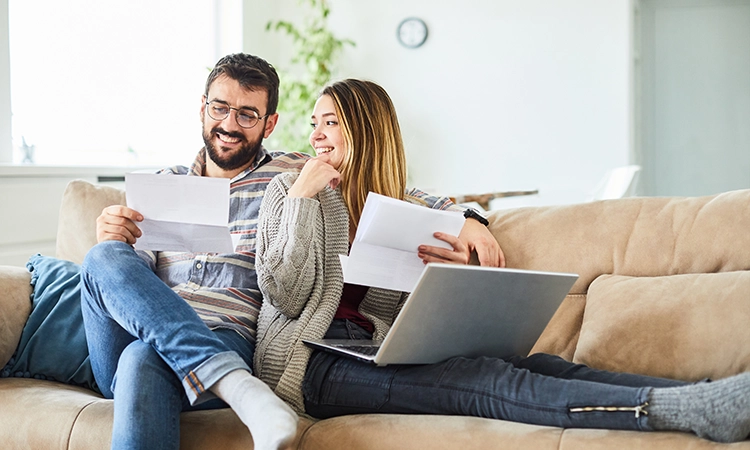 couple looking at bank statements
